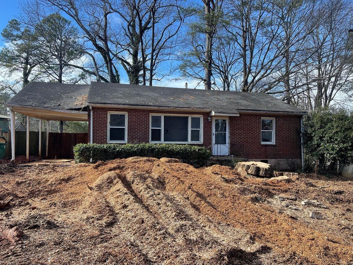 A finished J&K job — front yard ground level and clean after stump removal